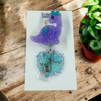 purple dinosaur badge reel